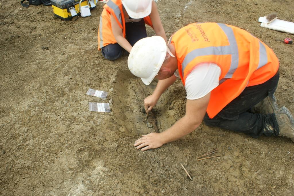 Archaeologists excavating Roman sword