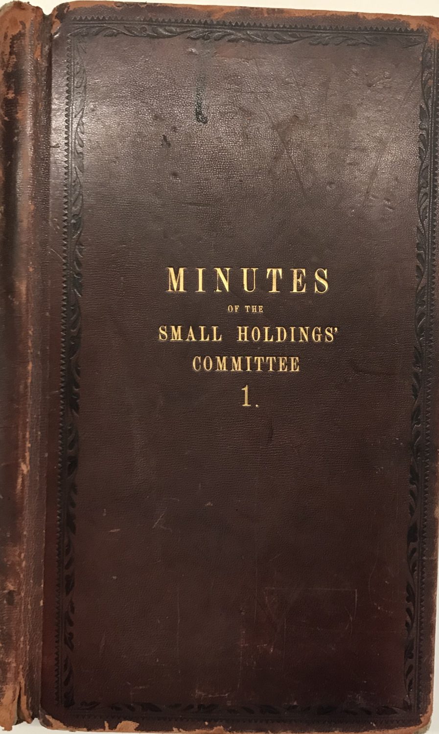 Leather cover of committee minute book