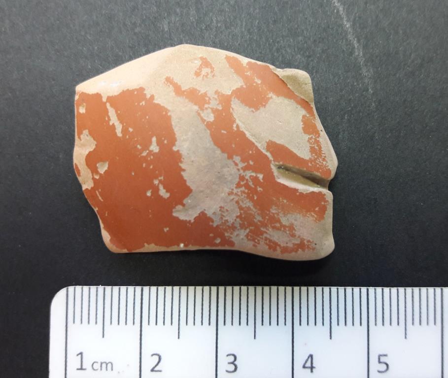 Samian ware fragment with rivet groove