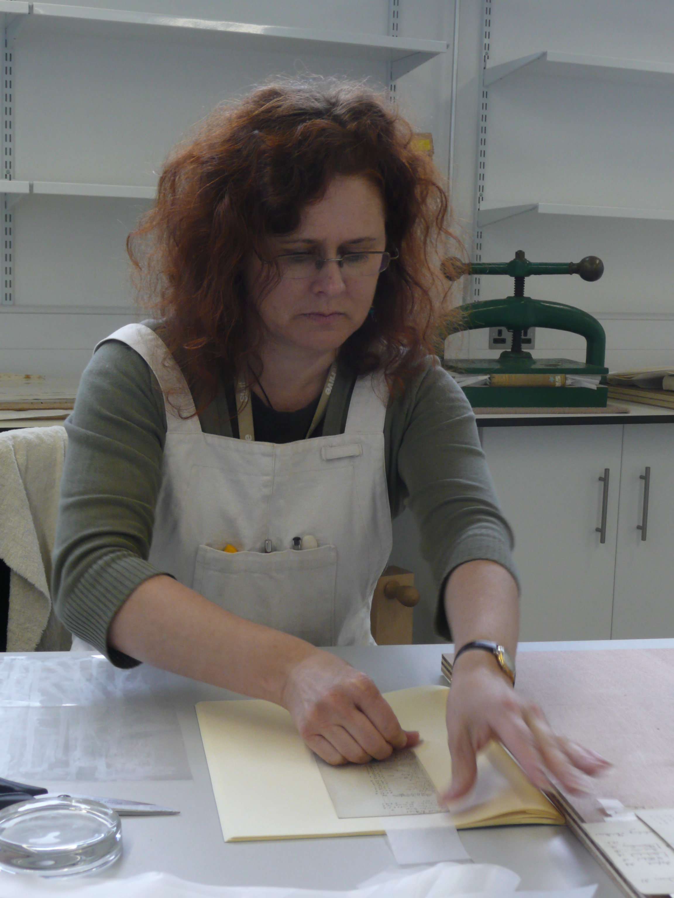 Rhonda, our Conservator, working on documents