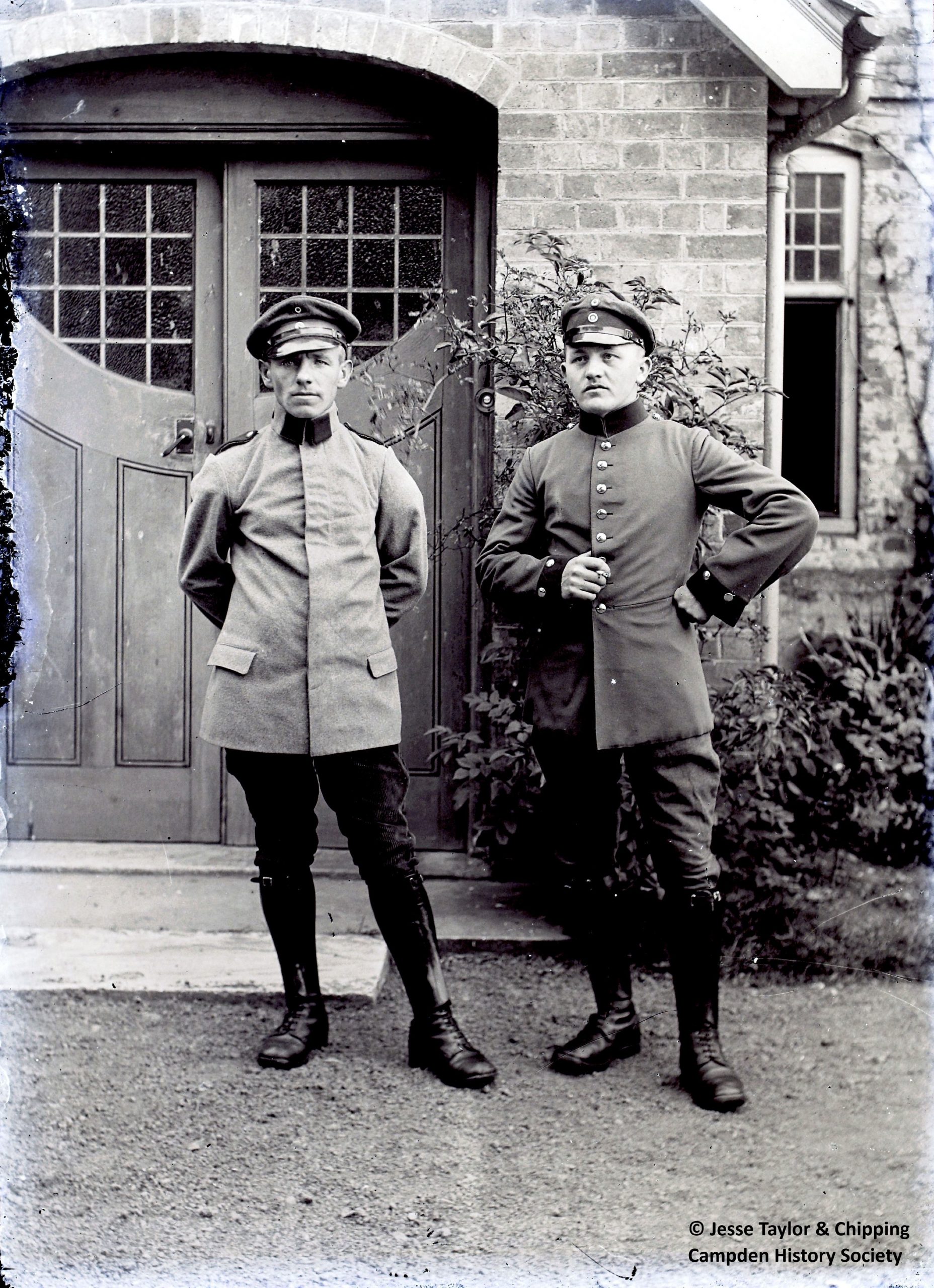 Portrait of two uniformed POWs