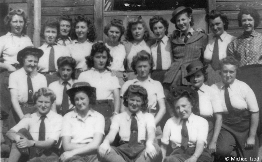 Formal shot of land girls in uniform