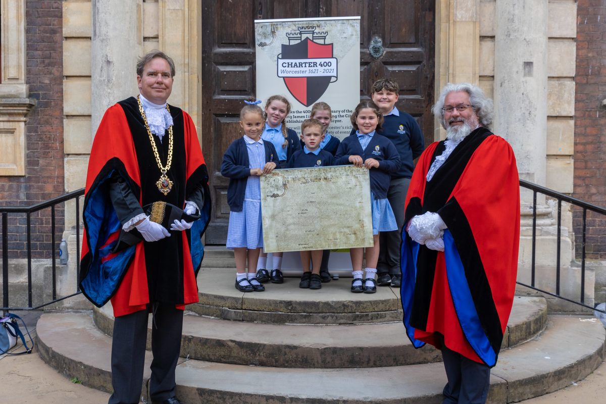 Mayor and Deputy Mayor with a replica of the 1621 Charter