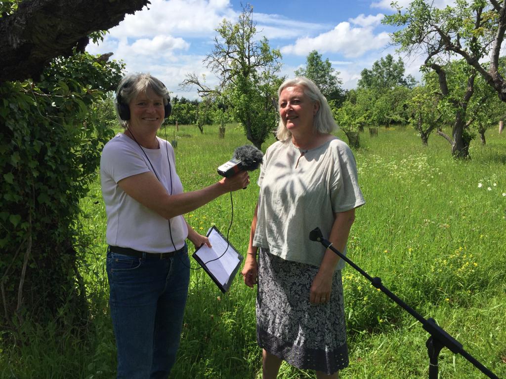 Julia letts and one of our volunteers recording link pieces for the podcast