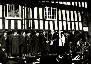 Picture of people on stage during queen proclamation 