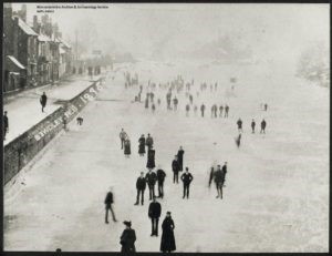 Picture of people playing on the frozen over river