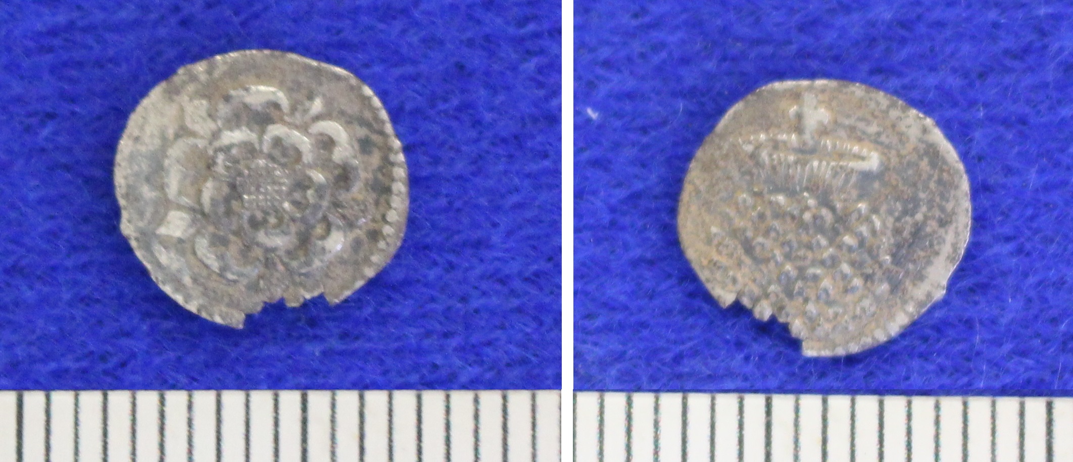 Both sides of a silver groat of Philip and Mary, 1554-8