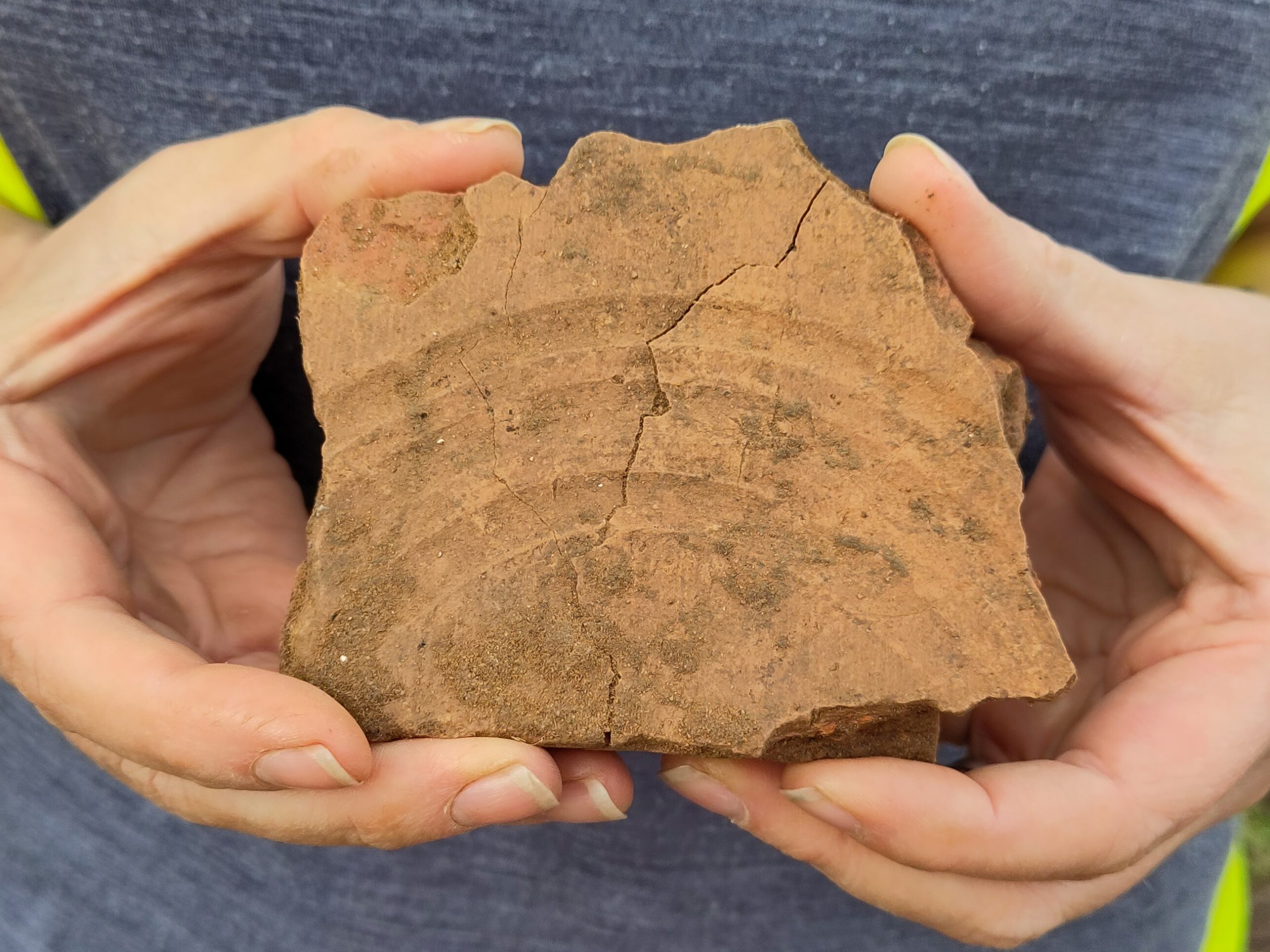 Roman roof tile fragment with fingermark impressions