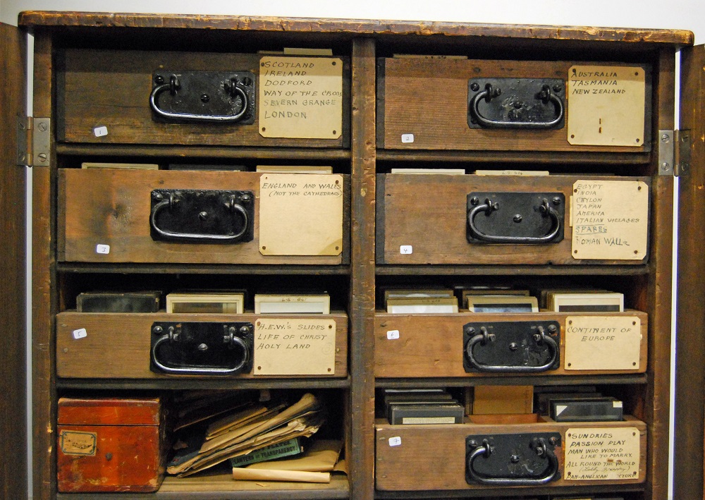 Labelled draws in a wooden cabinet containing glass slides