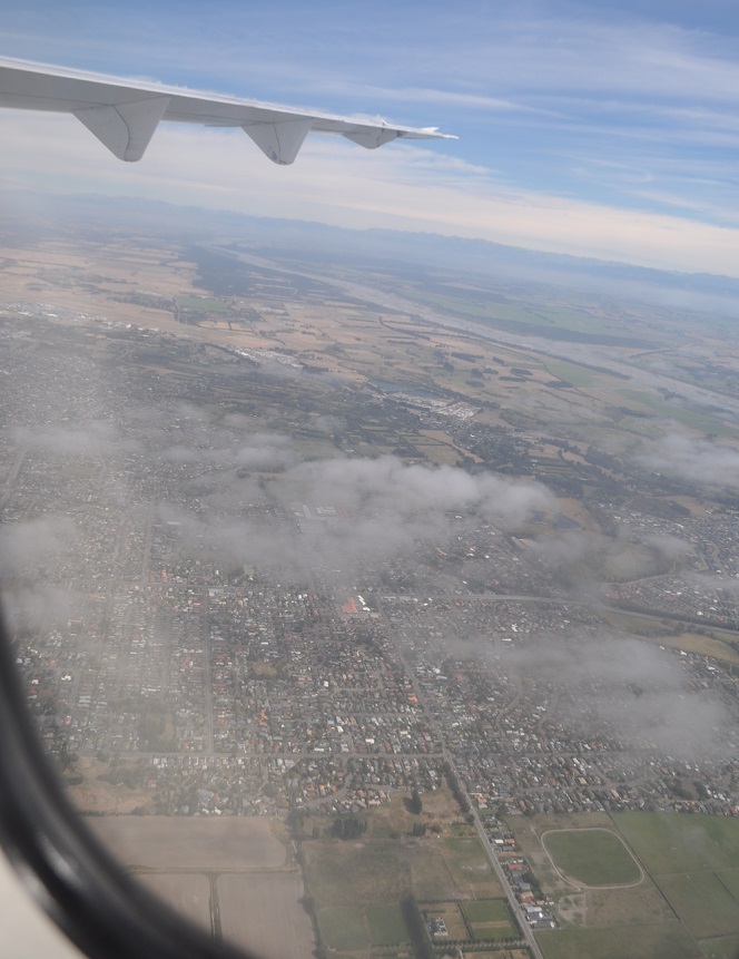 Christchurch and surrounding countryside, with river beyond, as seen from an airplane window