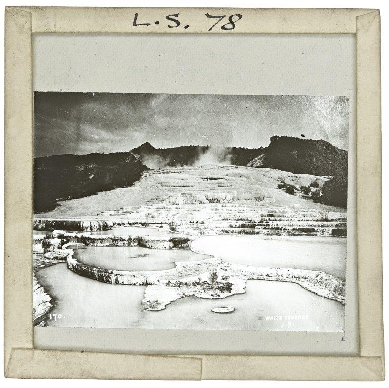 Glass slide showing terraces of water covering a slope