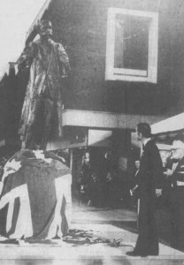 A black and white photograph of Prince Charles unveiling a statue of Edward Elgar in Worcester in 1981.