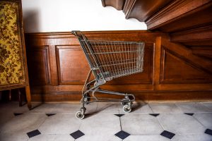 A shopping trolly under the stairs at Ombersley Court