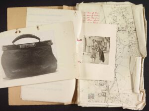 A colour photogrpah showing items from the Florrie files. These include a photo of her ans another photo of her handbag.