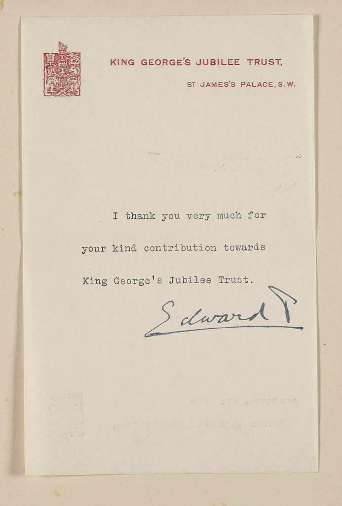 Red and black printed text and signature on paper. Text reads: Kings George Jubilee Trust; St. James's Palace, S.W. I thank you very much for your kind contribution to the King George's Jubilee Trust. Edward R