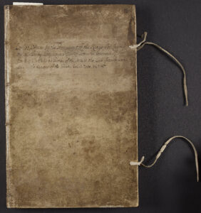 Cover of book, brown leather-bound. Two leather ties lie to right of book. Handwritten in black ink: "Copy of Orders for the Government of the King’s Bedchamber and Privy Lodgings and also of Letters & Warrants of the Earle of Portland as Groome of the Stole to the Lord Chamberlain and the Master of the Great Ward-Robe"